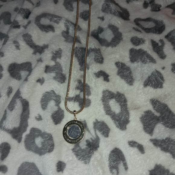 Elegant Gold and Silver Pendant Necklace